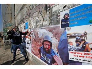 Filistinlilerden İsrail saldırısında gözünü kaybeden gazeteciye destek yürüyüşü