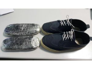 Genital bölgesinde ve ayakkabı tabanında uyuşturucu kaçakçılığı