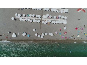 Meteoroloji uyardı Antalyalılar sahillere akın etti