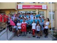 Muğla’nın şampiyon takımı Türk bayraklarıyla karşılandı