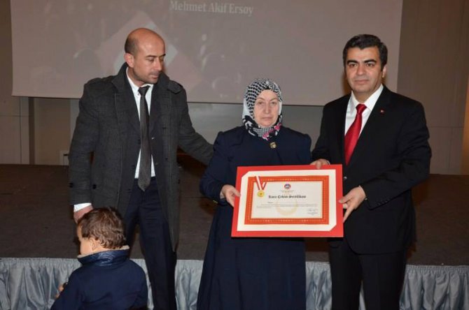 Kayseri'de bir hayırsever 14 şehit ailesine ev hediye etti