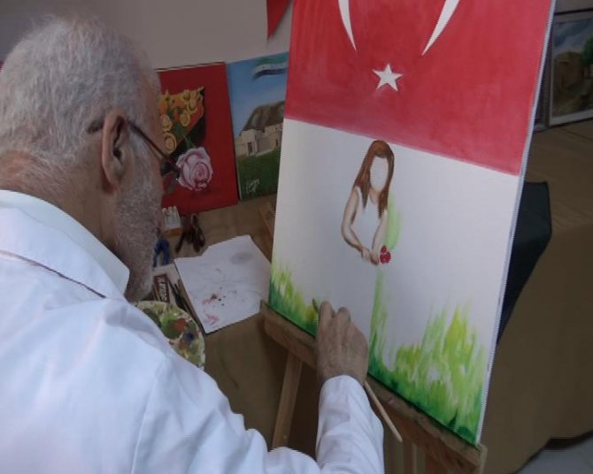 Suriyeli ressam dünyadaki zulmün resmini çiziyor
