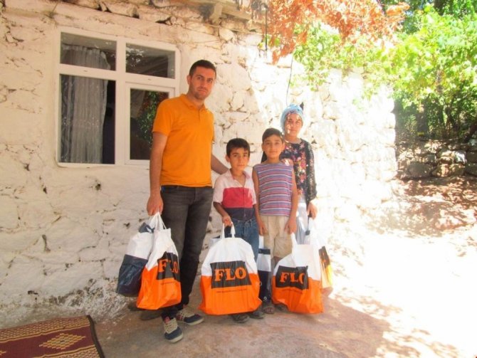 Sason’da yetim ve öksüz çocuklara giyim yardımı yapıldı