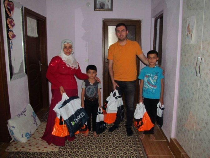 Sason’da yetim ve öksüz çocuklara giyim yardımı yapıldı