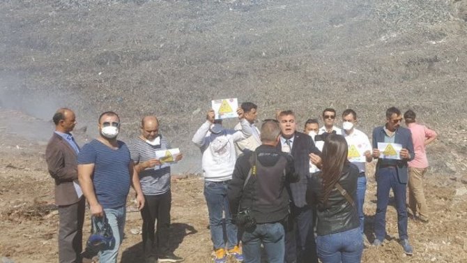 Bodrum’daki MHP’liler Çöplükten çıkan zehirli dumanlara isyan etti