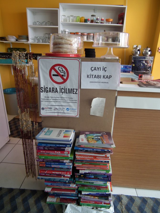 Çay iç, kitabı kap