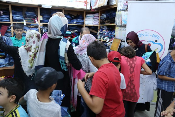 Gönül-Der, yetim çocukları giydirdi